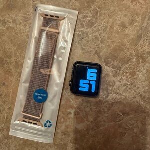 Apple Watch Series 3 (cellular model) with Beige Strap. Charger included
